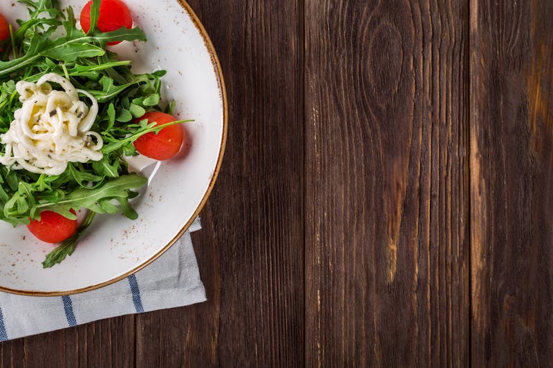 Arugula salad with shaved parmesan and lemon dressing
