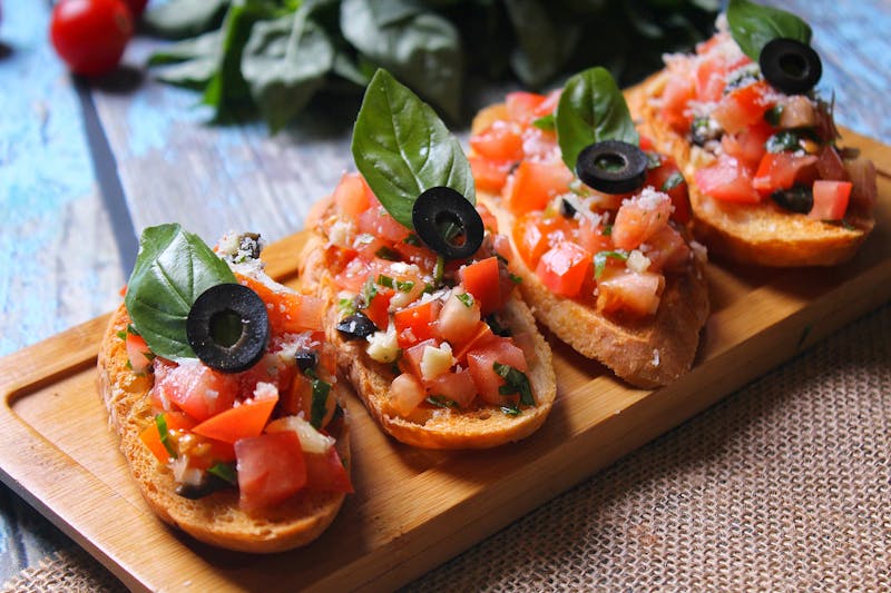 Fresh bruschetta on toasted coal-fired bread